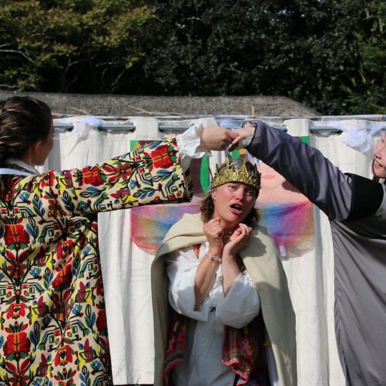Performing King Coel's Curtains in the Lower Bowls Green in Castle Park (July 2022)